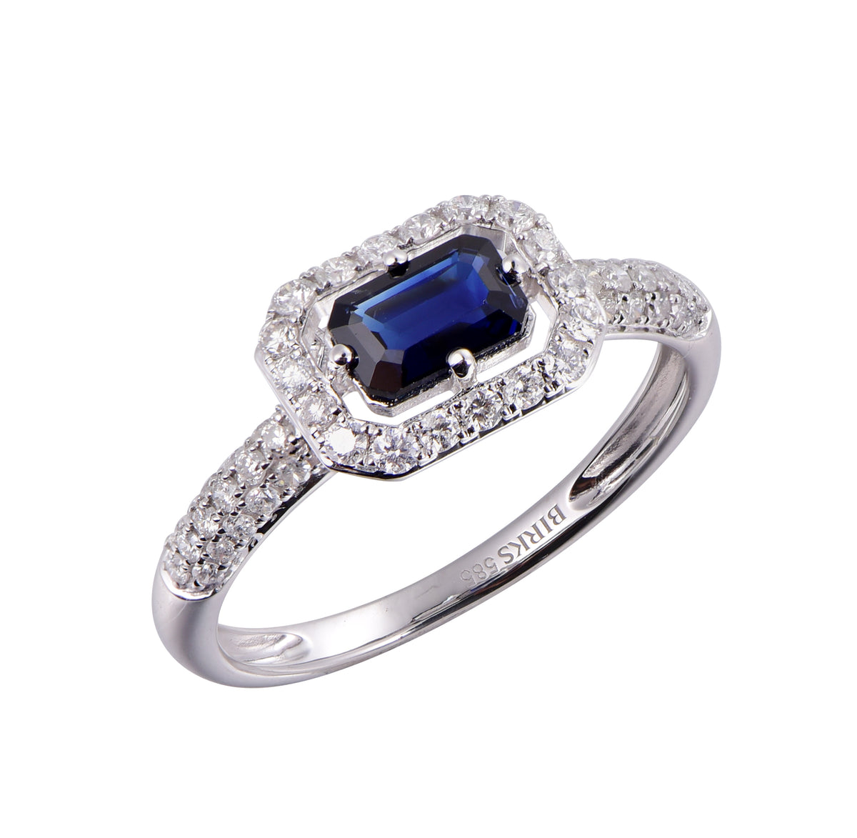 14K white gold ring featuring an emerald-cut blue sapphire surrounded by a diamond halo with diamond-set shoulders