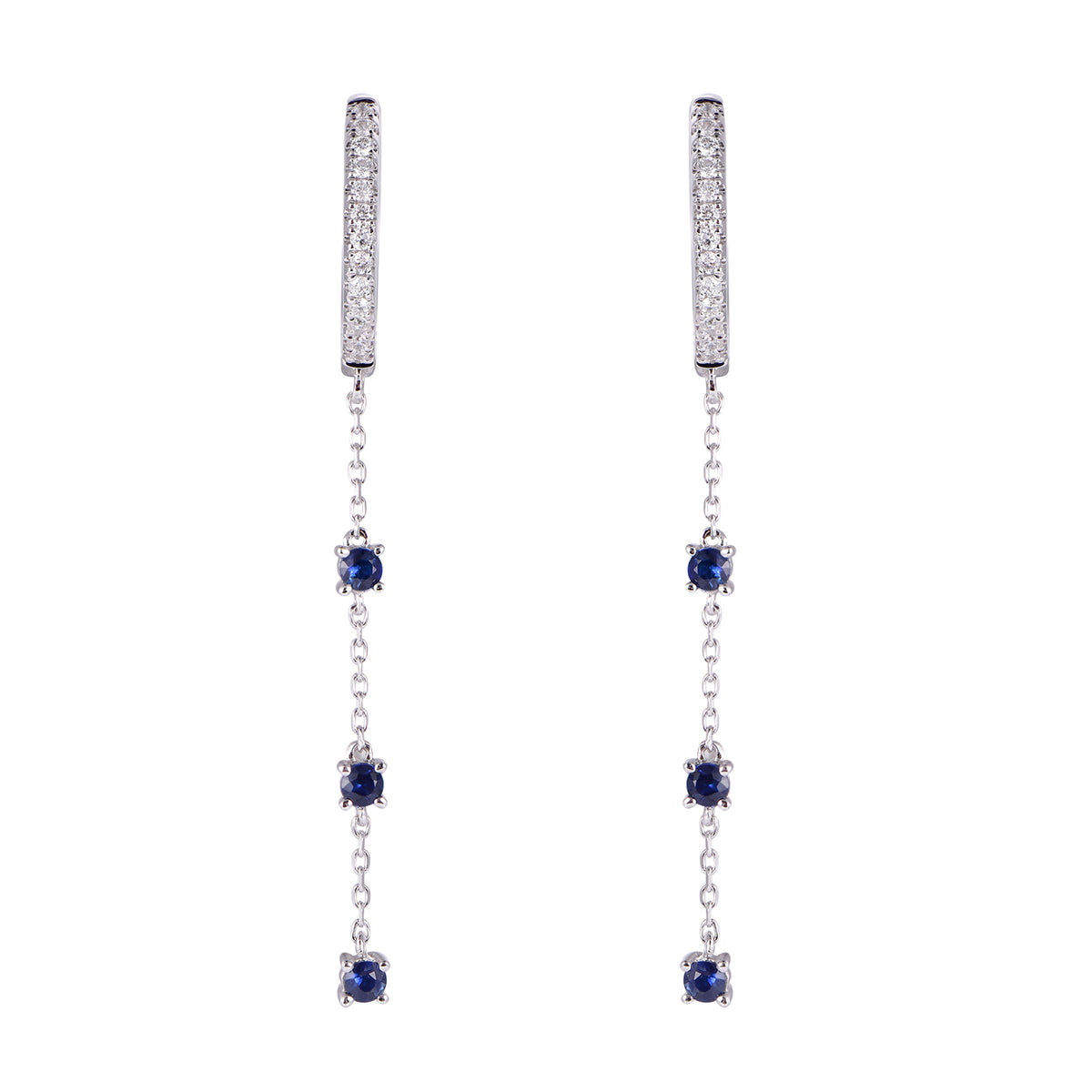 A pair of silver-tone dangle earrings featuring a pavé-set top bar, a central chain with four round-cut deep blue sapphires, and small clear accent stones along the lower chain, shown against a plain white background.